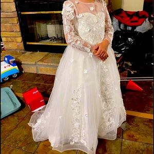 Flower girl dress. Very pretty but was too big. Size 8 but fits closer to a 10.
